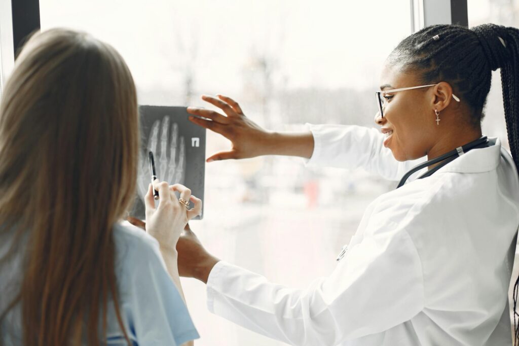healthcare workers talking about xray